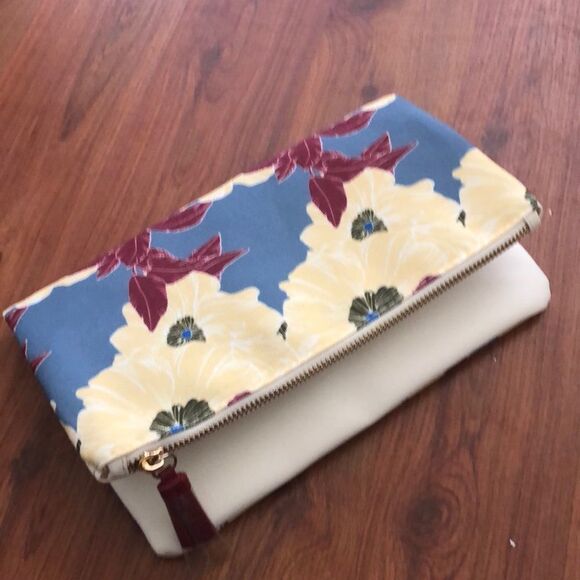 Rachel Pally Handbags - NWT Rachel Pally Floral and cream canvas clutch.